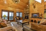 Great Room with a gas fireplace overlooking the mountains
